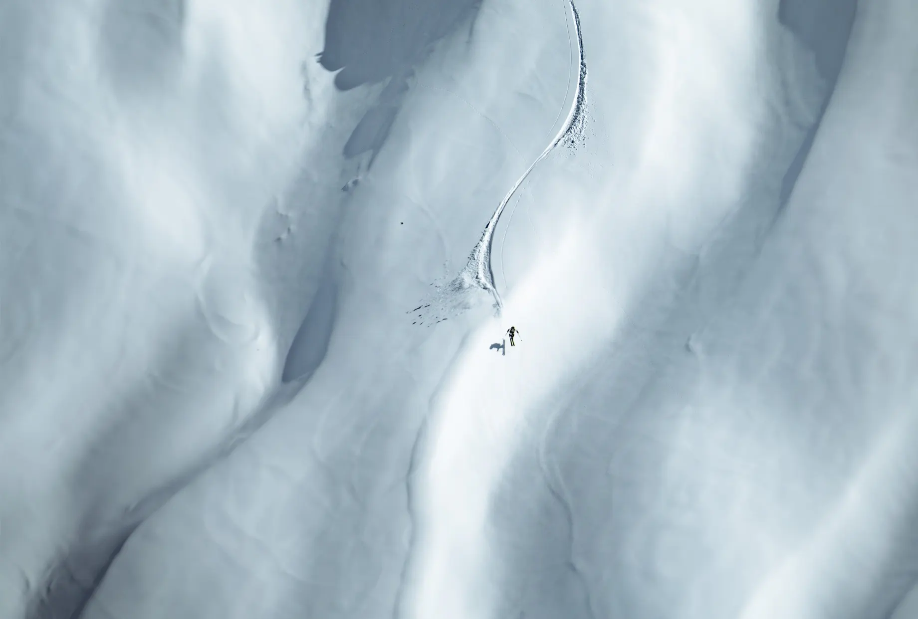 Skier in a snowy mountain landscape for Kästle